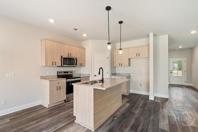 304 Timberlake Dr, Rincon, GA 31312 - kitchen with appliances with stainless steel finishes, light brown cabinetry, light stone counters, dark wood-style floors, and recessed lighting