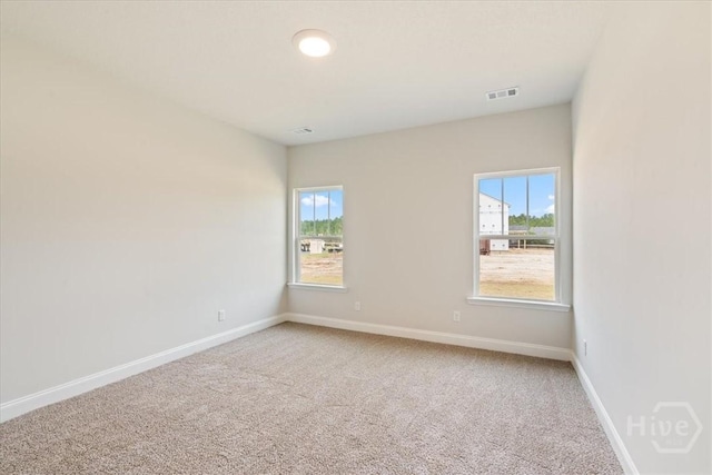 304 Timberlake Dr, Rincon, GA 31312 - spare room featuring light carpet and baseboards