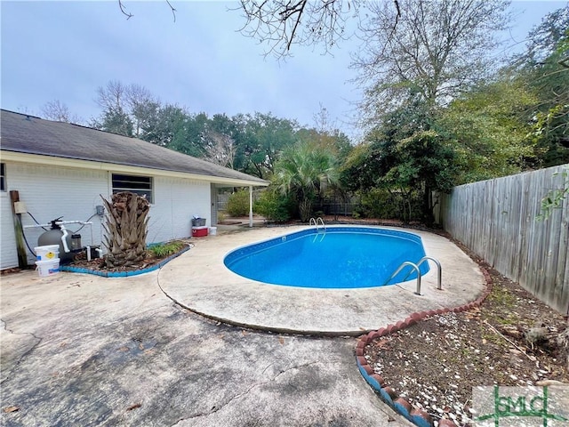 view of pool with a patio