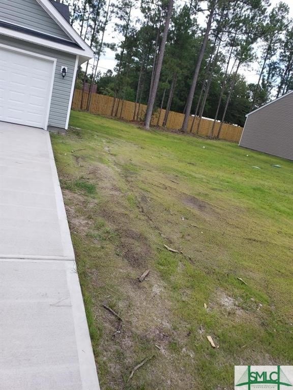 view of yard featuring a garage