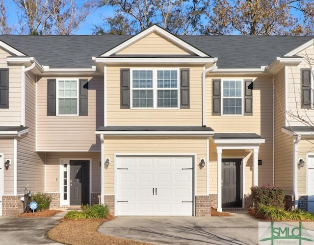 view of property with a garage