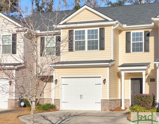 view of front of property with a garage