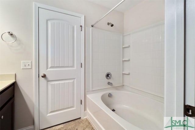 bathroom featuring vanity and shower / bath combination