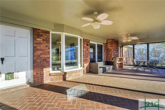 view of patio / terrace featuring ceiling fan