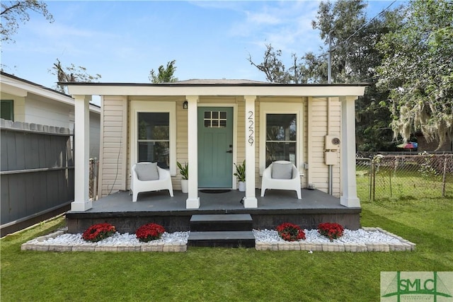 exterior space with a yard and a porch