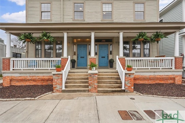 206-208 W 42nd St, Savannah, GA 31401 - view of front of property with a porch