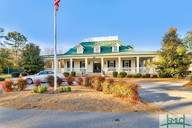 view of front of house with covered porch and ceiling fan