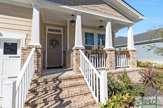 doorway to property featuring a porch