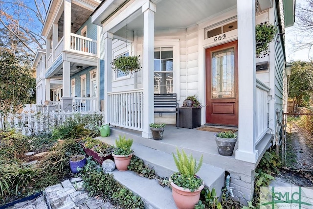 doorway to property featuring a porch