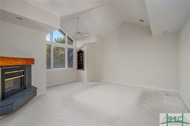 unfurnished living room featuring ceiling fan, light carpet, and vaulted ceiling