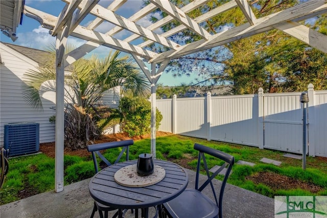 view of patio / terrace featuring cooling unit and a pergola