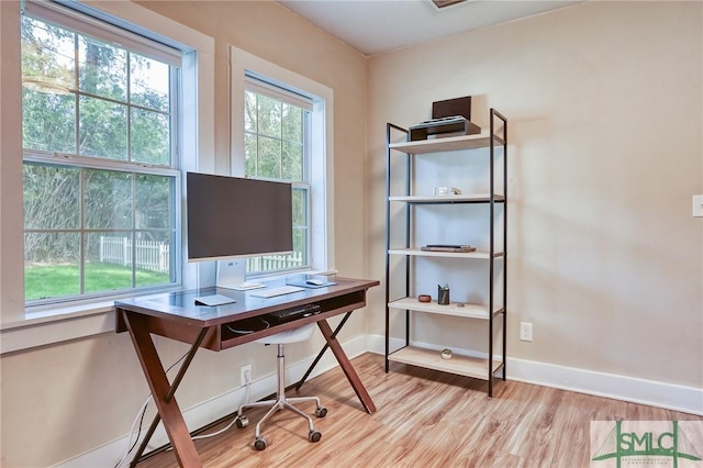 office space featuring light hardwood / wood-style floors