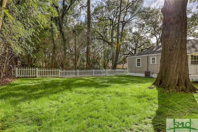 view of yard with central AC