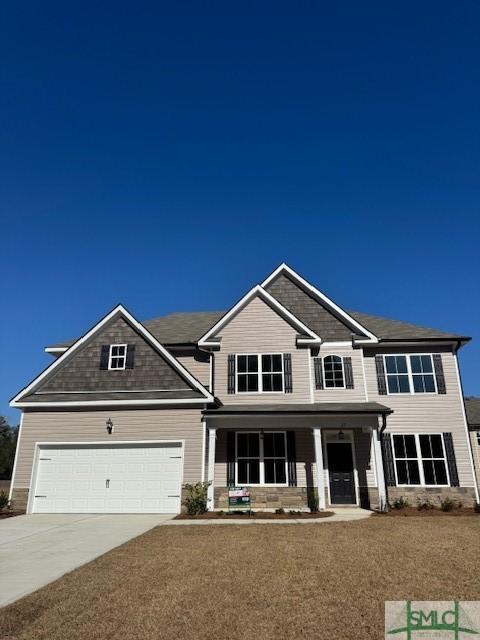 craftsman-style house with a garage and a porch