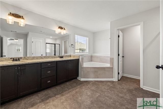 bathroom featuring a bath, a sink, an enclosed shower, and double vanity