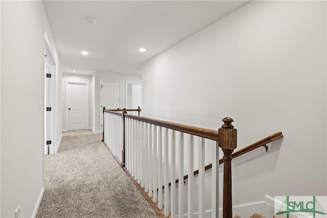 corridor with recessed lighting, baseboards, and carpet floors