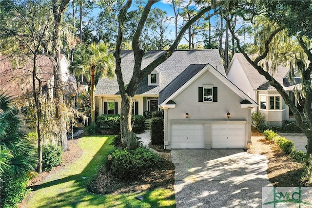 view of front of home with a garage