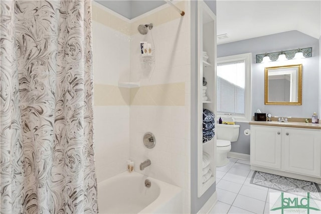 full bathroom with tile patterned floors, shower / tub combo with curtain, vanity, and toilet