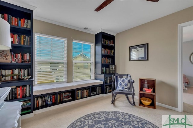 living area featuring carpet floors