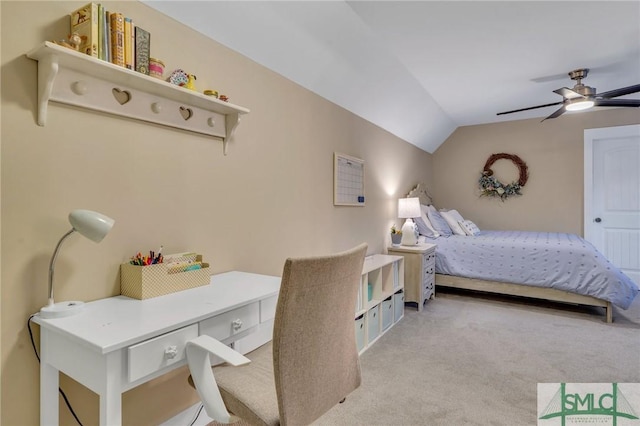 bedroom with light colored carpet, ceiling fan, and vaulted ceiling