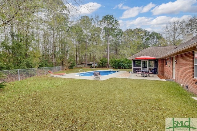 view of yard with a patio, a fenced in pool, and a gazebo