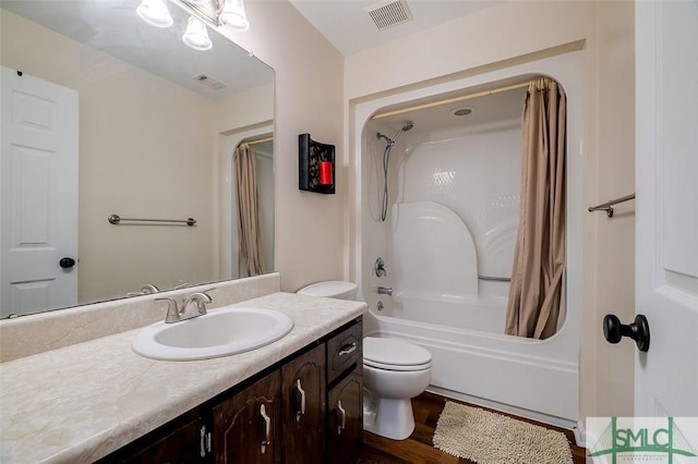 full bathroom with toilet, vanity, shower / bath combination with curtain, and hardwood / wood-style flooring