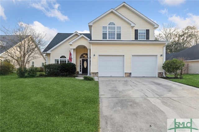 view of front of house featuring a front lawn and a garage