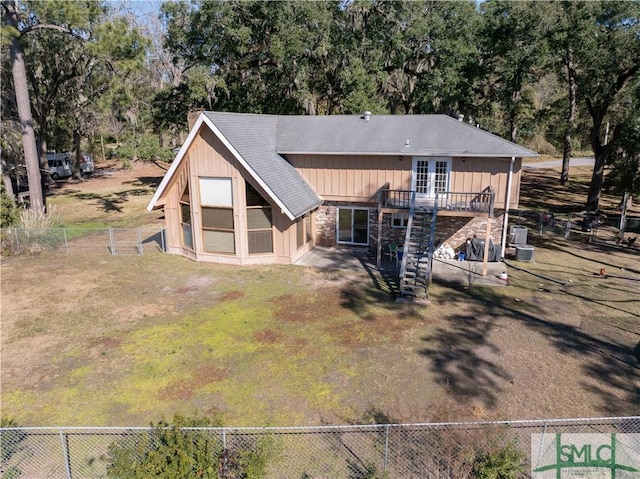 back of property featuring french doors