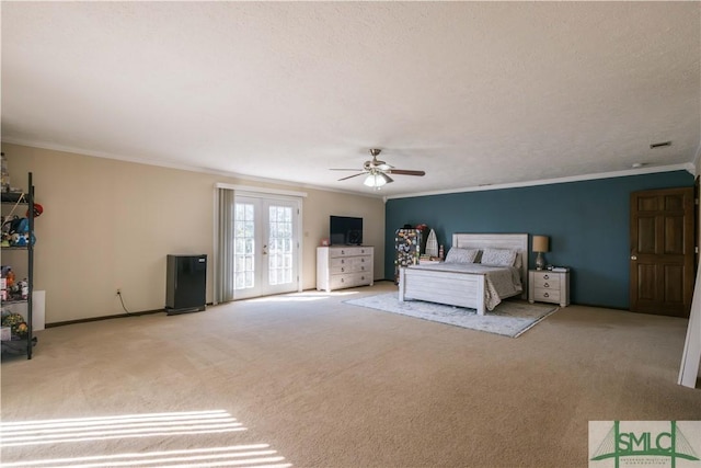 unfurnished bedroom featuring a textured ceiling, light carpet, french doors, ceiling fan, and crown molding