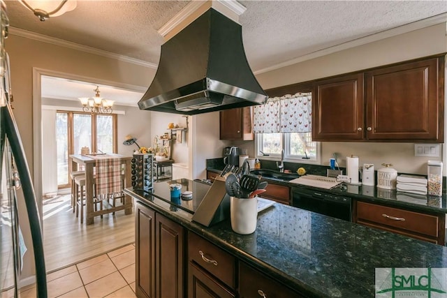 kitchen featuring light tile patterned floors, island exhaust hood, a textured ceiling, crown molding, and sink