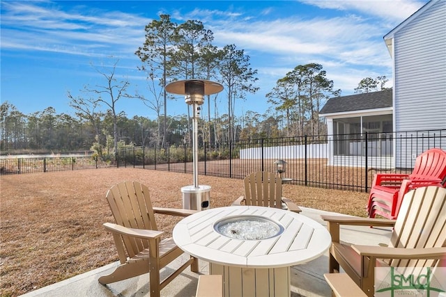 view of patio with a sunroom