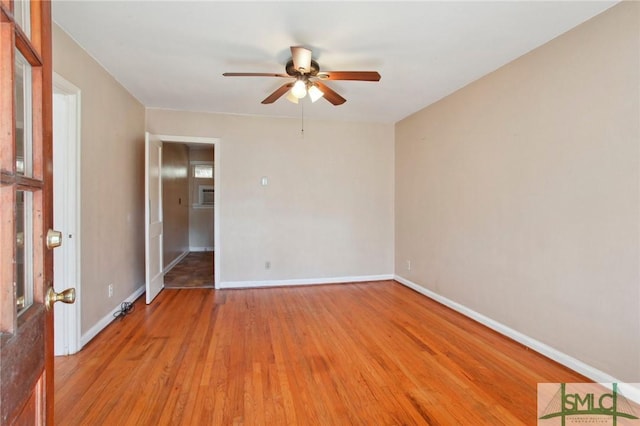 unfurnished room featuring light hardwood / wood-style floors and ceiling fan