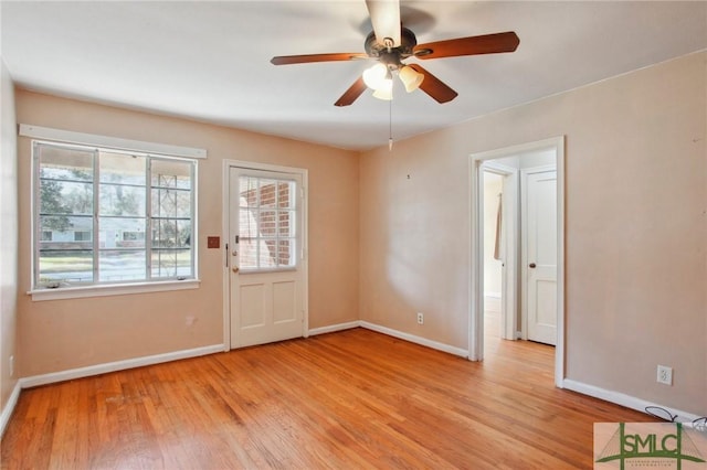 spare room with ceiling fan and light hardwood / wood-style floors