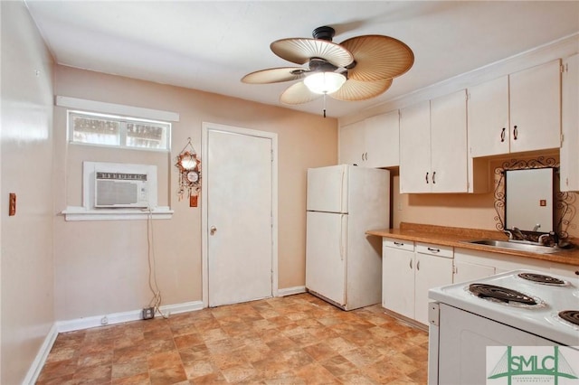 kitchen featuring ceiling fan, white cabinetry, sink, and white appliances