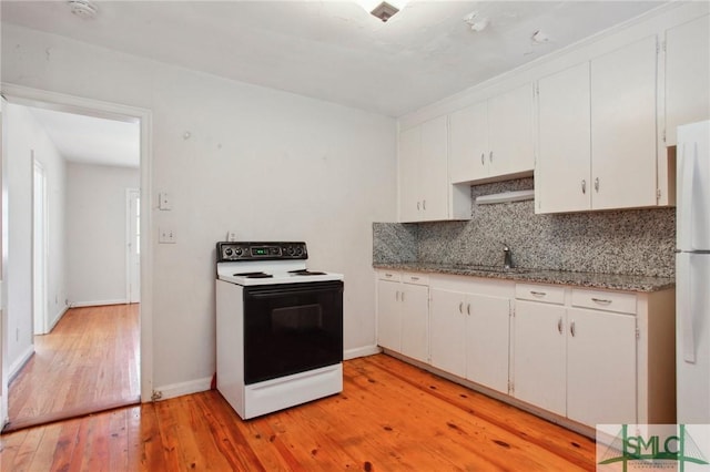 kitchen featuring white cabinetry, sink, light hardwood / wood-style floors, and electric range oven