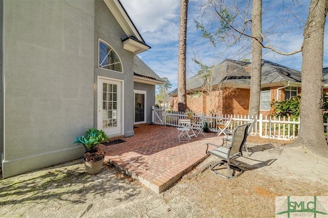 view of patio with fence