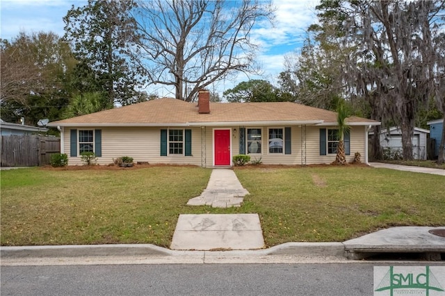 ranch-style home with a front yard