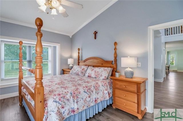 bedroom featuring ceiling fan, vaulted ceiling, dark hardwood / wood-style flooring, and crown molding