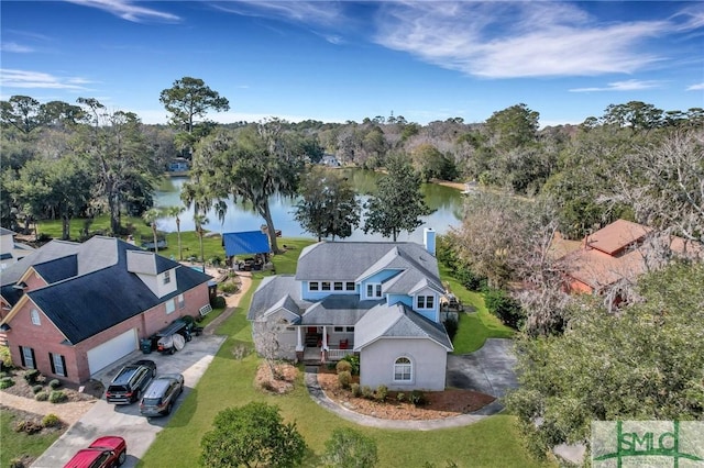 birds eye view of property featuring a water view