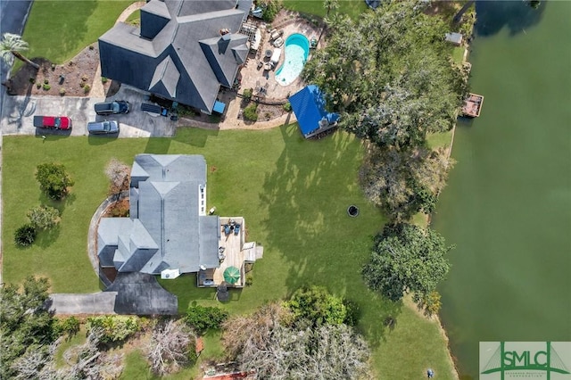 drone / aerial view with a water view