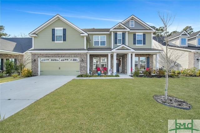 craftsman inspired home with a garage, covered porch, and a front lawn