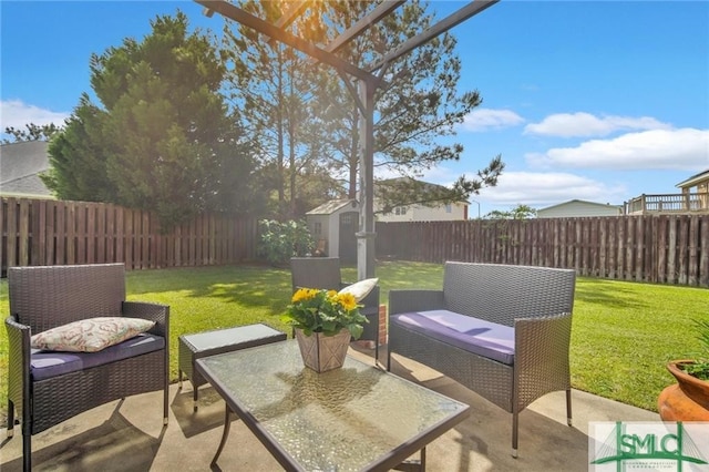 view of patio with outdoor lounge area and a storage unit