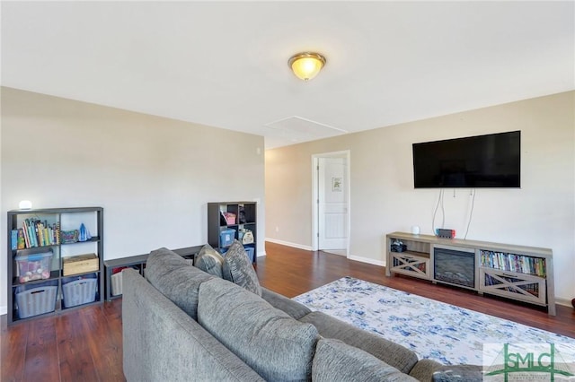 living room with dark hardwood / wood-style floors