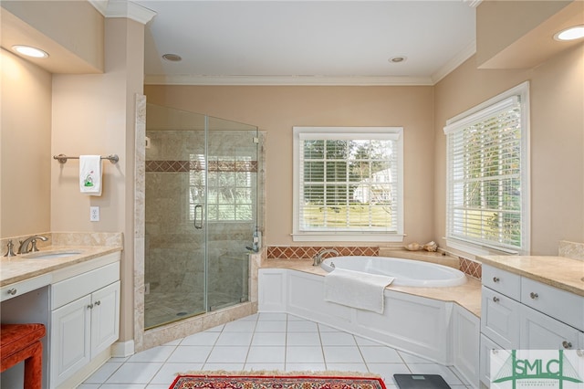 bathroom with ornamental molding, tile patterned flooring, separate shower and tub, and vanity