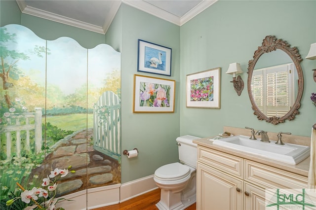 bathroom featuring toilet, vanity, crown molding, and hardwood / wood-style floors