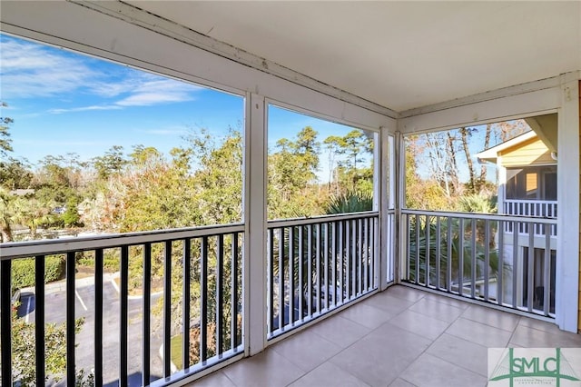 unfurnished sunroom with plenty of natural light