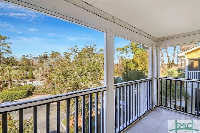 unfurnished sunroom with plenty of natural light