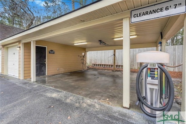 exterior space featuring a garage and a carport