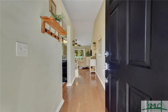 hall with light wood-type flooring