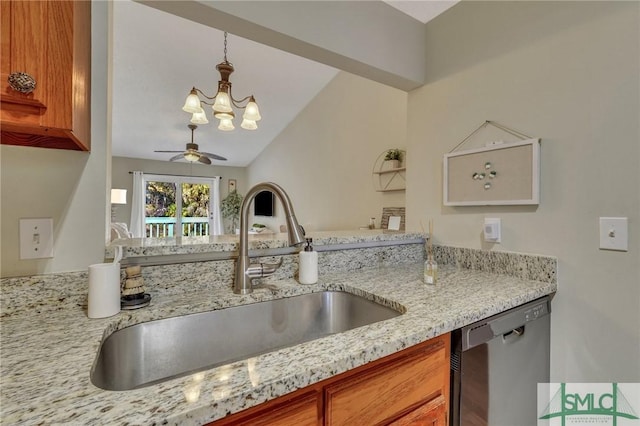 kitchen with ceiling fan with notable chandelier, sink, light stone counters, and stainless steel dishwasher